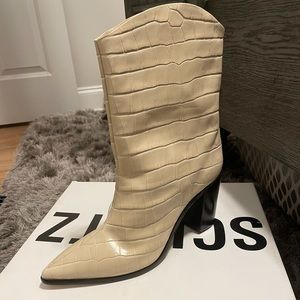 Shutz Cowgirl ankle boots.
